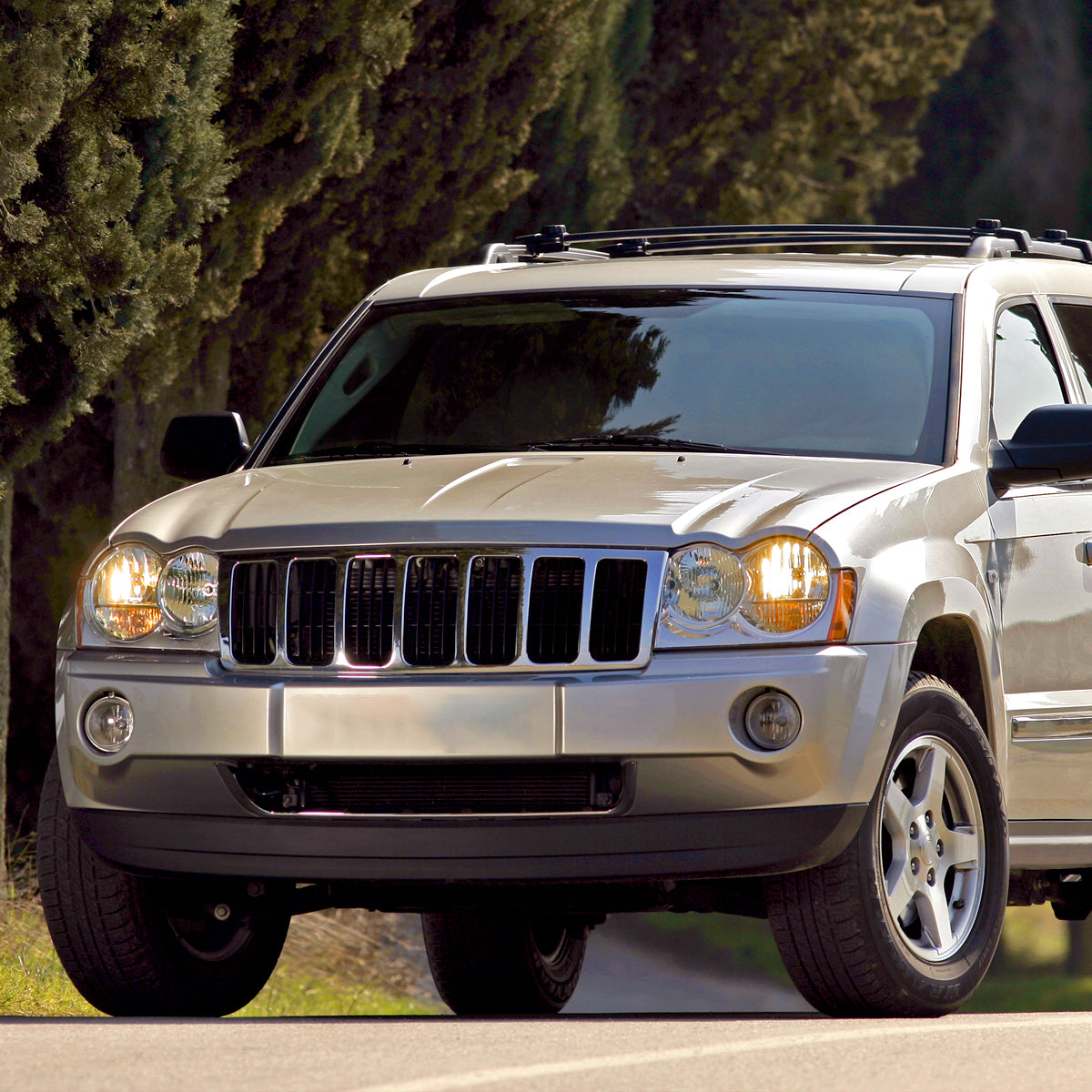 Spec-D 06 Jeep Grand Cherokee OE chrome headlights