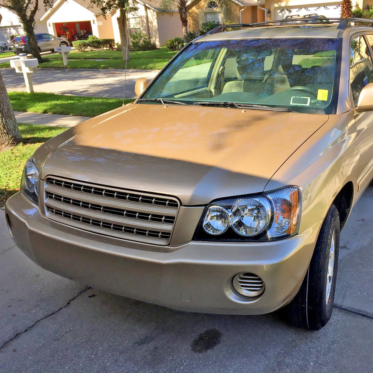 Spec-D 02 Highlander Factory chrome headlights