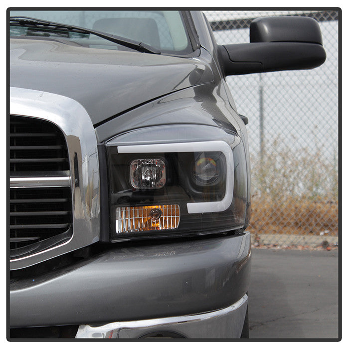 Spyder 06-09 Dodge Ram 1500 06-08 Ram 2500 3500 Version 2 Projector Headlights Light Bar DRL Black installed
