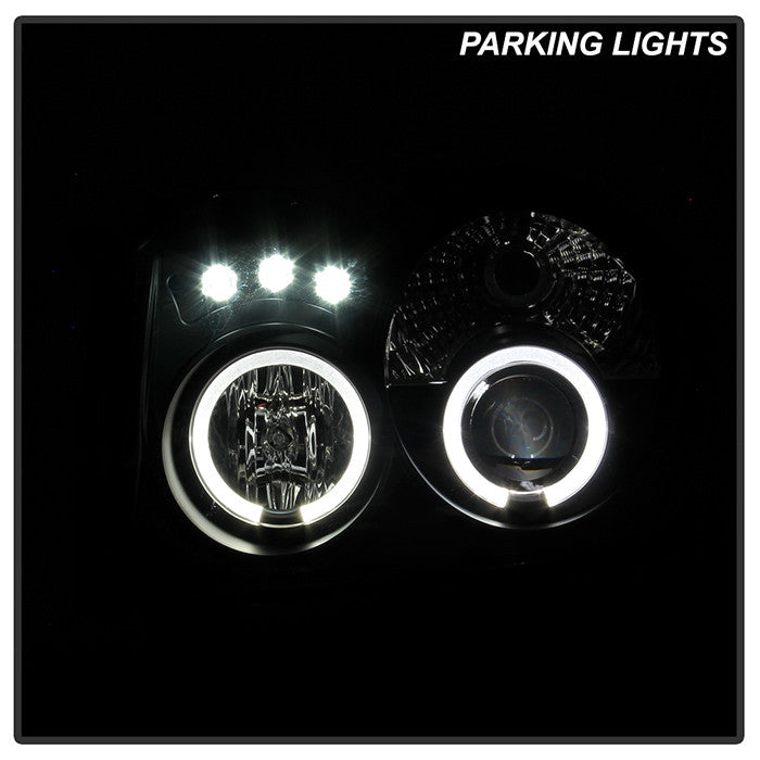 Spyder 05-07 Jeep Grand Cherokee Projector Headlights LED Halo Black installed