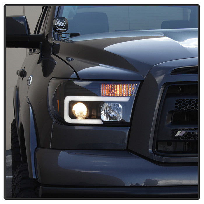 PRO-YD-TTU07V2-LB-BK Toyota Tundra/ Sequoia 08-13 LED Bar Pro Headlight Black angle of side view lights on