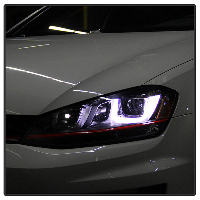 VW Golf VII 14-19 DRL LED Headlights Red Stripe Black installed side view angled halo on