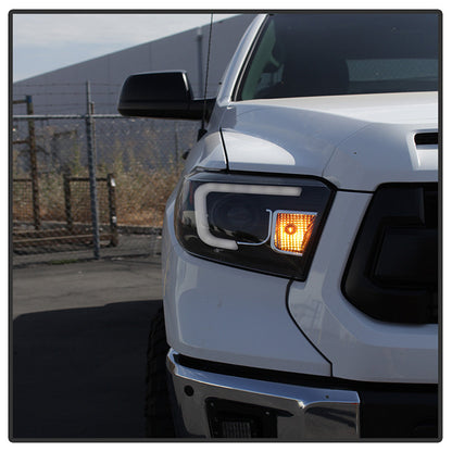 PRO-YD-TTU14-DRL-BK Toyota Tundra 14-21 LED Bar DRL Projector Headlight Black side view ro angle view of one light on