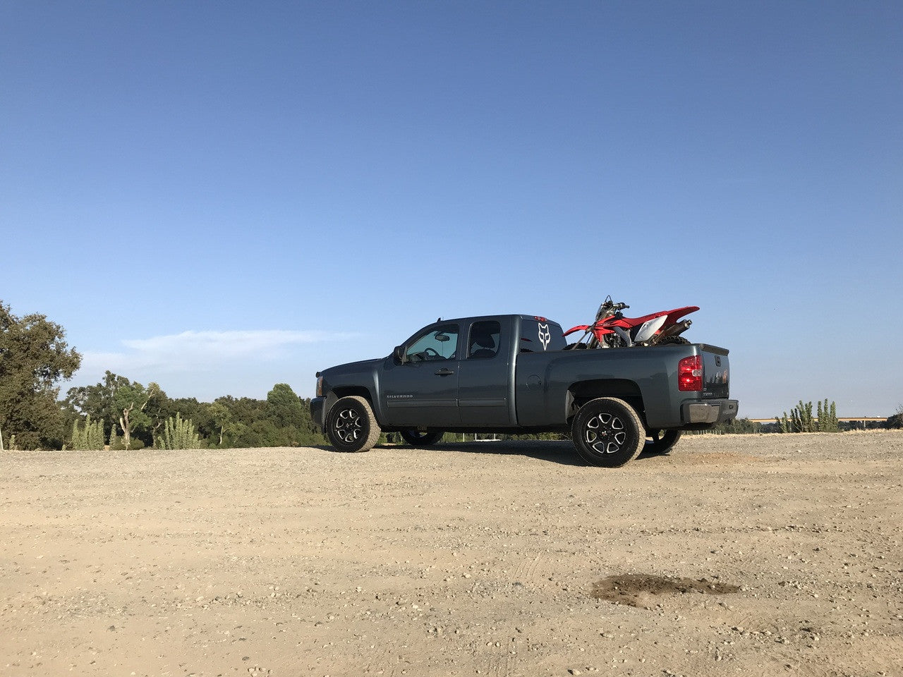 displayed on Chevy Silverado DX4 20x9 Type STORM 6/139.7 Gloss black ball milled 4x4 off road wheels (X42090310108GBBM